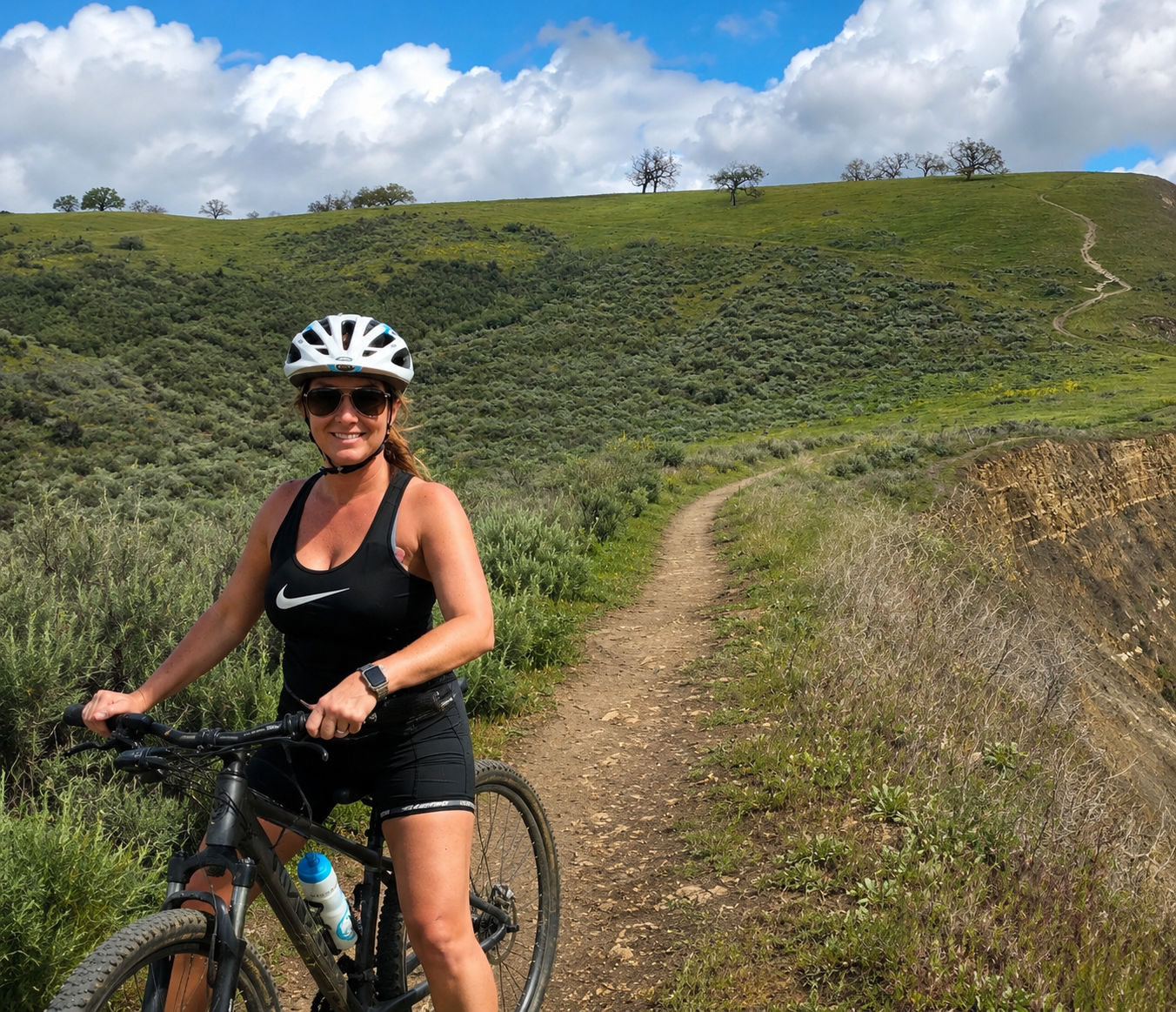 Dawn mountain biking on open space trail